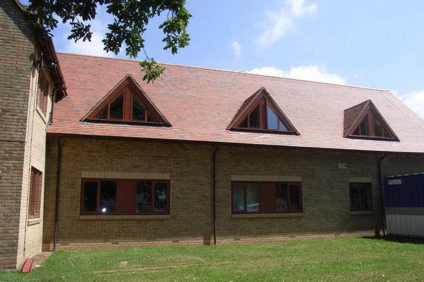 Triangular shaped windows with opening sashes