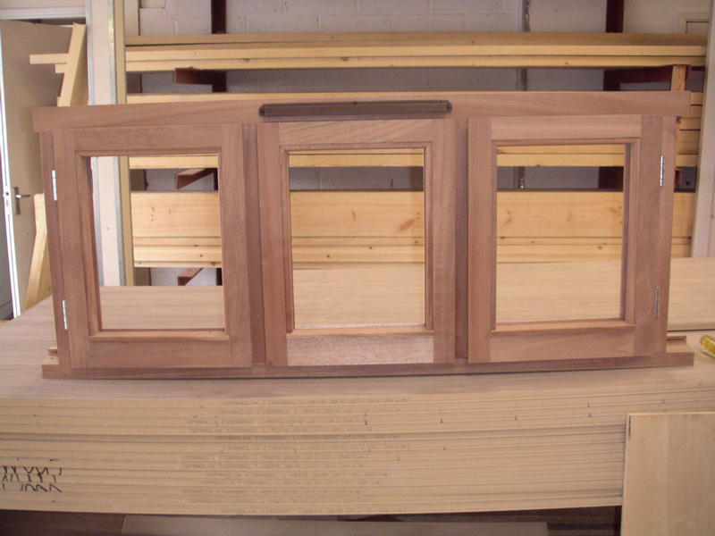 Traditional sapele stormproof window