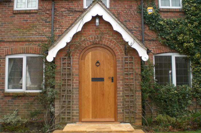 Oak door frame with circular head