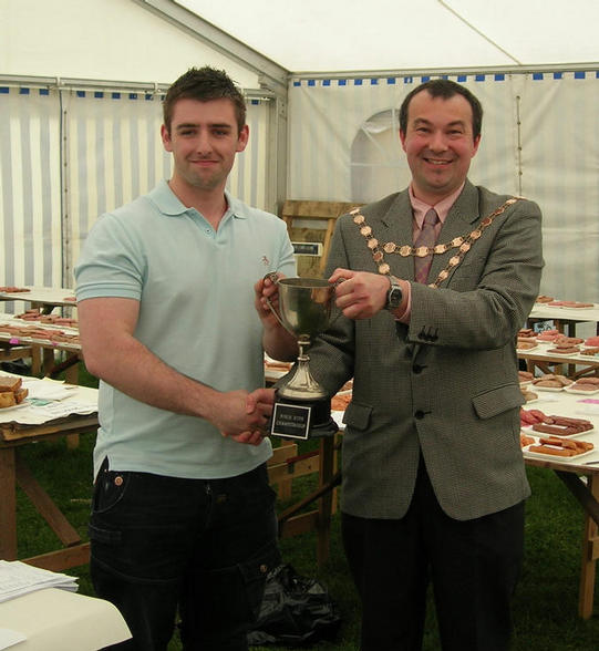 Tristan Meier, H Dayus Butchers, Worcester receiving the Nottinghamshire Council of Retail Meat Traders Trophy