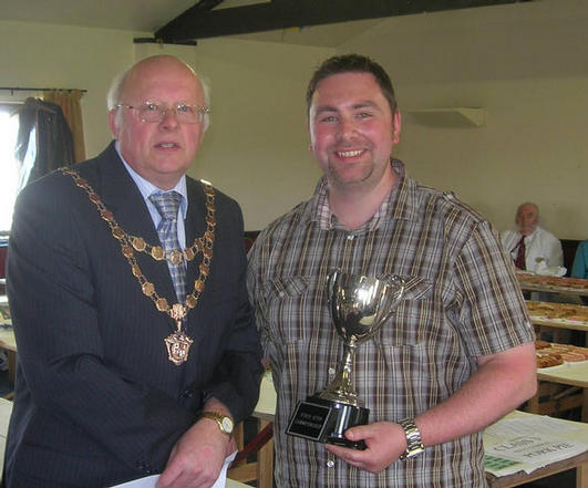Daniel Wilkinson receiving the 'Nottinghamshire Council of Retail Meat Traders' Trophy