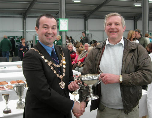 Michael Kennedy receiving the Sibley Trophy for Best Sample Pork Sausage 2010