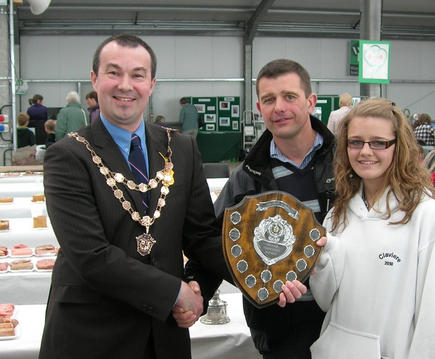 Nigel Hofmann receiving the Council Shield as overall Sausage Winner for his Speciality Sausage from Martin Carnell, President of the Nottinghamshire Council of Retail Meat Traders