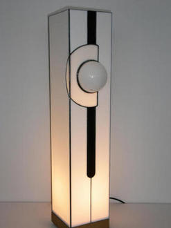 light on oak base with white glass globe set in white circle wirh dark purple stripe
