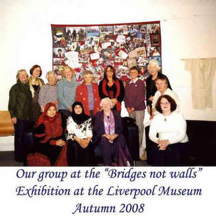 Group at Bridges not Walls exhibition