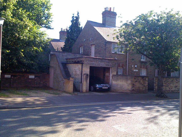 Two spaces on the gravel or in the garage at the rear of the practice
