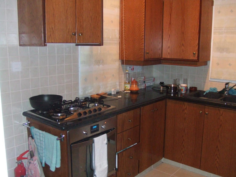Kitchen is fully equiped with electric cooker with gas hob
