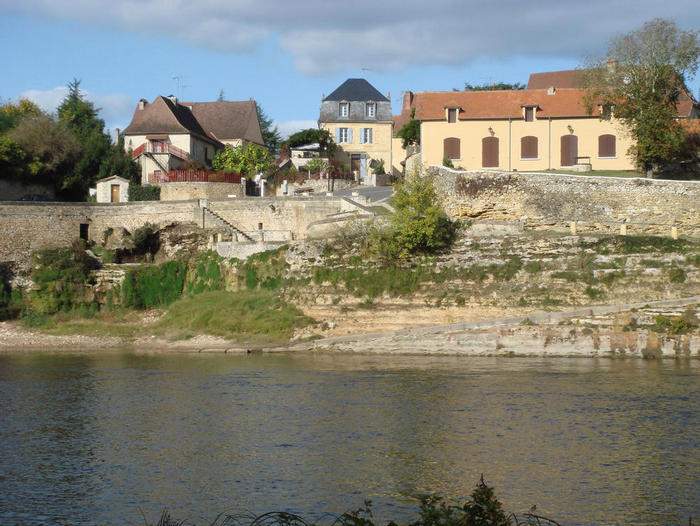 A picture of the house from across the river