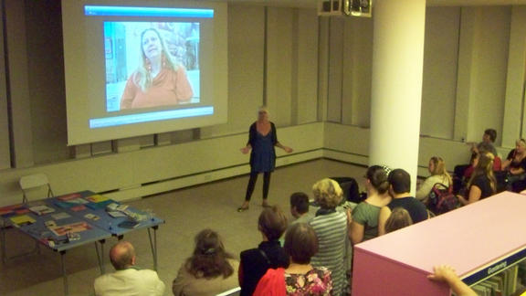 Talking and showing the video that was made as part of the workshops.