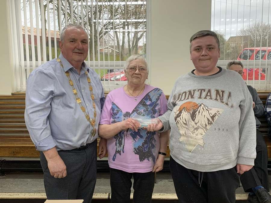 Dianne and Sandra Wilson Receiving the award from President Keith Allison