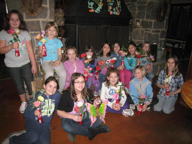 Scouts with flower arrangements