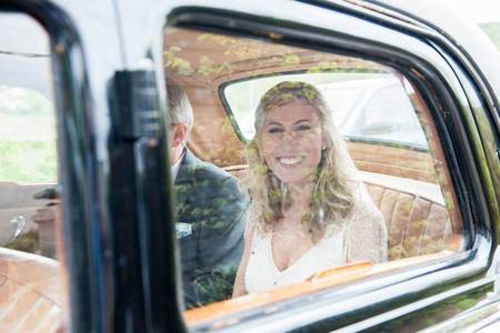 Hannah through the car windows