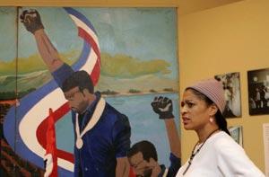San Jose, Ca. Museum Curator Stands amid Artifacts of "Speed City"