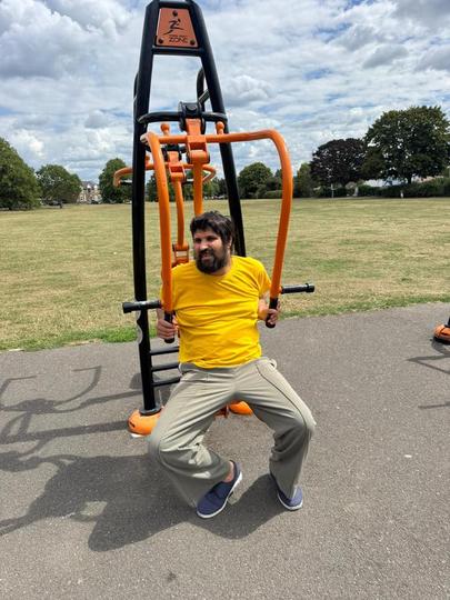 Exercising on machine in the park 