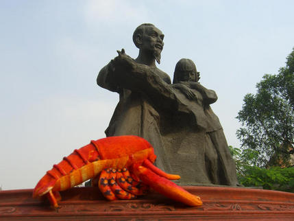 At the statue of Ho Chi Minh, HCM City, Viet Nam