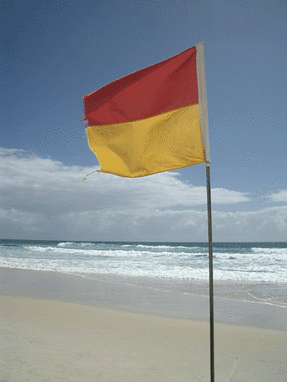 Flag on beach at Gold Coast