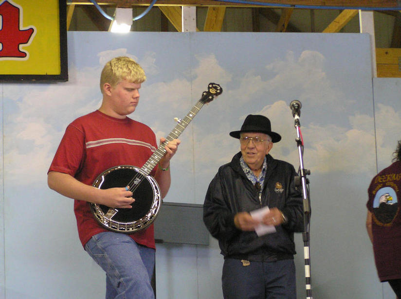 The third place prize is a Deering Black Diamond Banjo and Elliot Capo