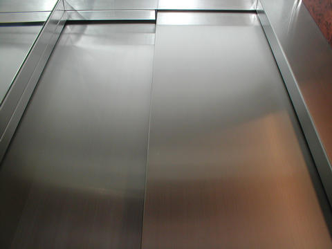 A standard lift door like this can be refurbished at a fraction of the cost of replacing or recovering