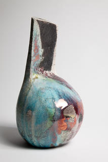 Whistle shaped vessel