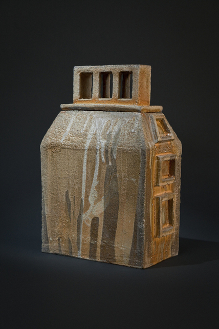 Slab form with a clerestory Lid, wood fired with poured glazes, lid based on clerestory type roofs.