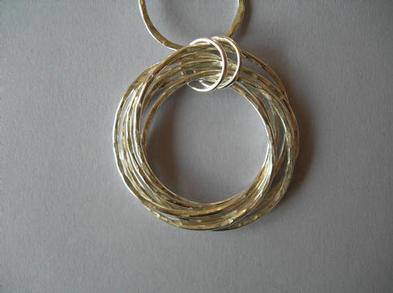 Mobius, pendants earrings and bracelets.