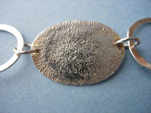 Oval .5mm disc.