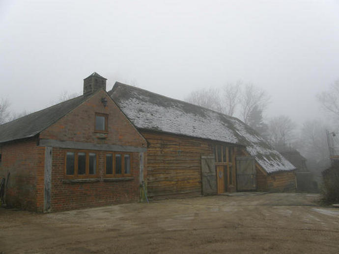 The finished Barn, shrouded in late afternoon mist