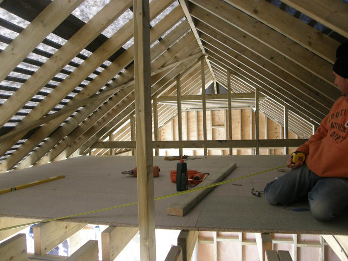 Loft floor going in, framework still on view