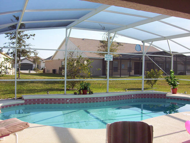ENCLOSED SCREENED HEATED POOL & PATIO