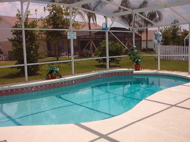 ENCLOSED SCREENED POOL W/SIDE WALL SPRINKLER PORTS