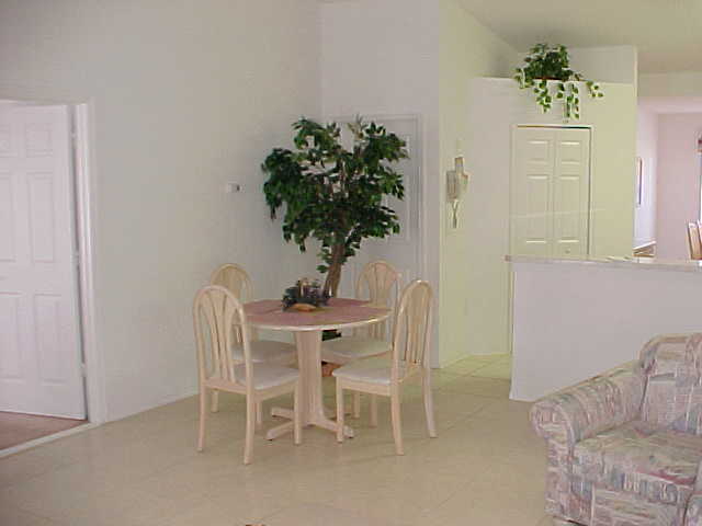 KITCHEN TABLE SET & HOUSE PHONE-WALL UNIT