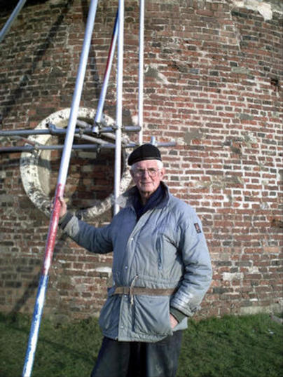These pictures were taken by Andrew Milward and son, showing the repairs to the concrete cap of the windmill due to the ingress of water through the porouse concrete roof.