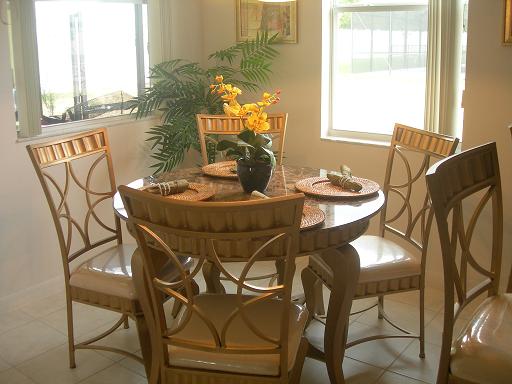 THE TABLE IN THE NOOK IS JUST RIGHT FOR BREAKFAST