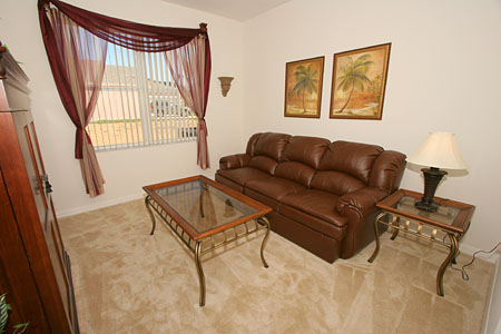 THIS IS THE DEN .THERE'S ANOTHER T/V HIDDEN IN THAT CABINET