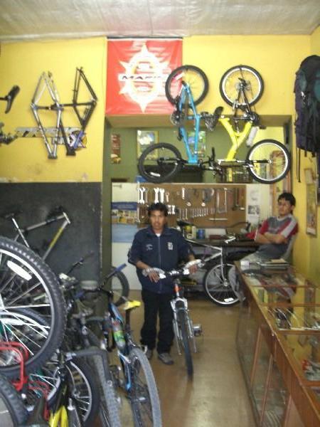 Olger and my bike in his shop, Arequipa August 2006