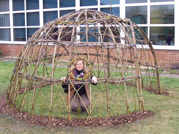 Elaine in a school living willow dome