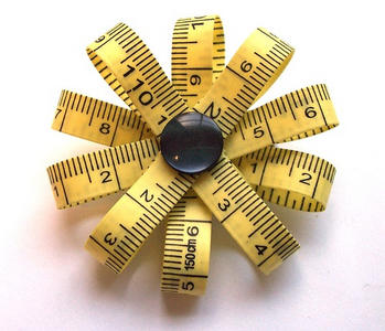 Tape measure brooch depicting you can lose weight with hypnosis