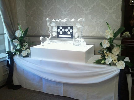 Ice sculpture table plan again matching the theme with co-ordinating Flowers