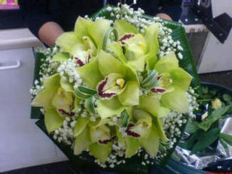 A green cymbidium nosegay posy
