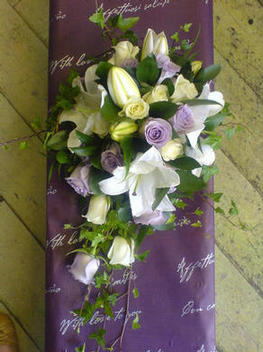 Oriental lily and lilac roses bouquet