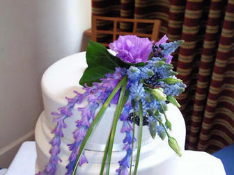 Fresh cascading cake corsage