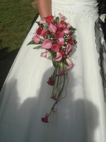 cresent bouquet in pink calla and roses