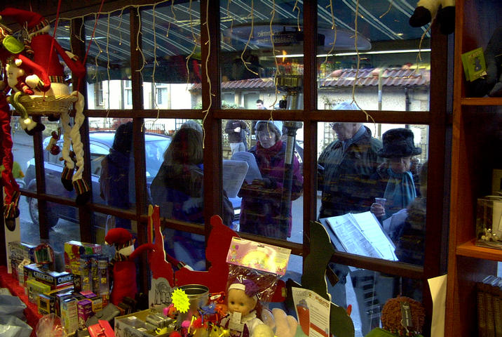 Gargunnock Songsters Carol Singing Outside The Shop